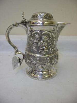 Appraisal: A GEORGE III LIDDED JUG converted from a tankard of