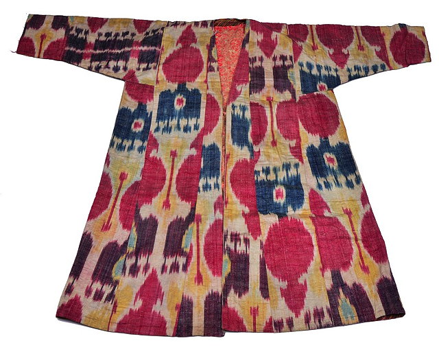 Appraisal: AN UZBEK SILK IKAT COAT with long sleeves and floral