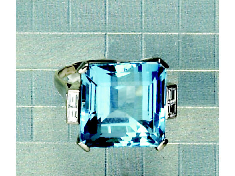 Appraisal: AQUAMARINE RING Platinum lady's ring set with one step cut