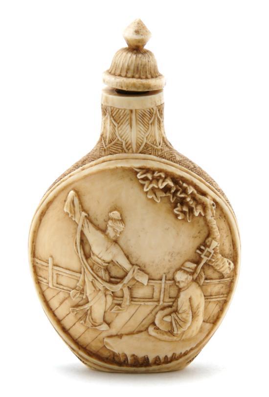 Appraisal: Carved Ivory Snuff Bottle each side depicting figures set within