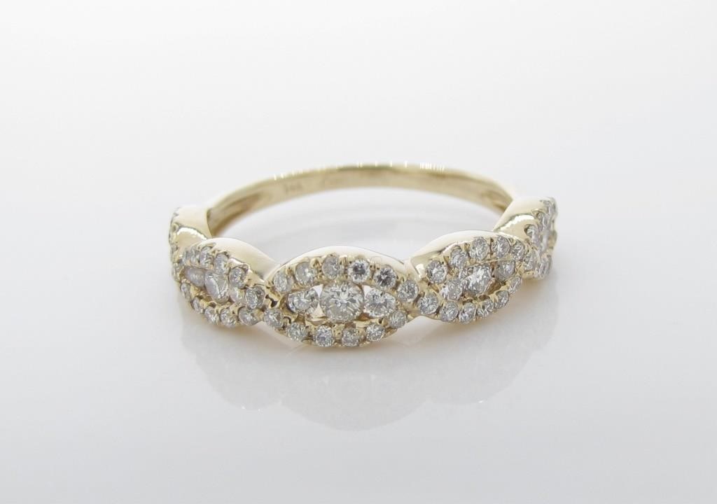 Appraisal: An elegant K yellow gold diamond stack band with five