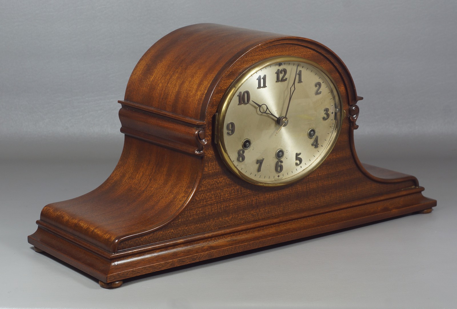 Appraisal: German Mahogany Tambour Mantle Clock by Hamburg Amerikanische Uhrenfabrik jewels