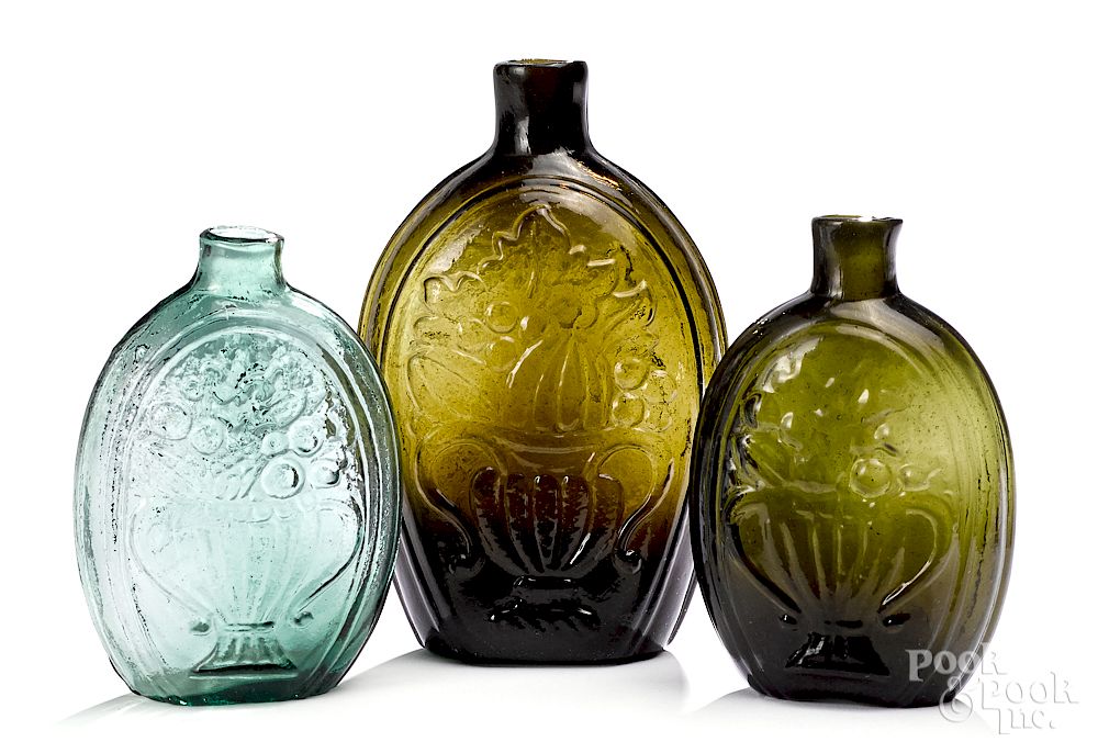 Appraisal: New England Historical cornucopia glass flasks Three New England Historical