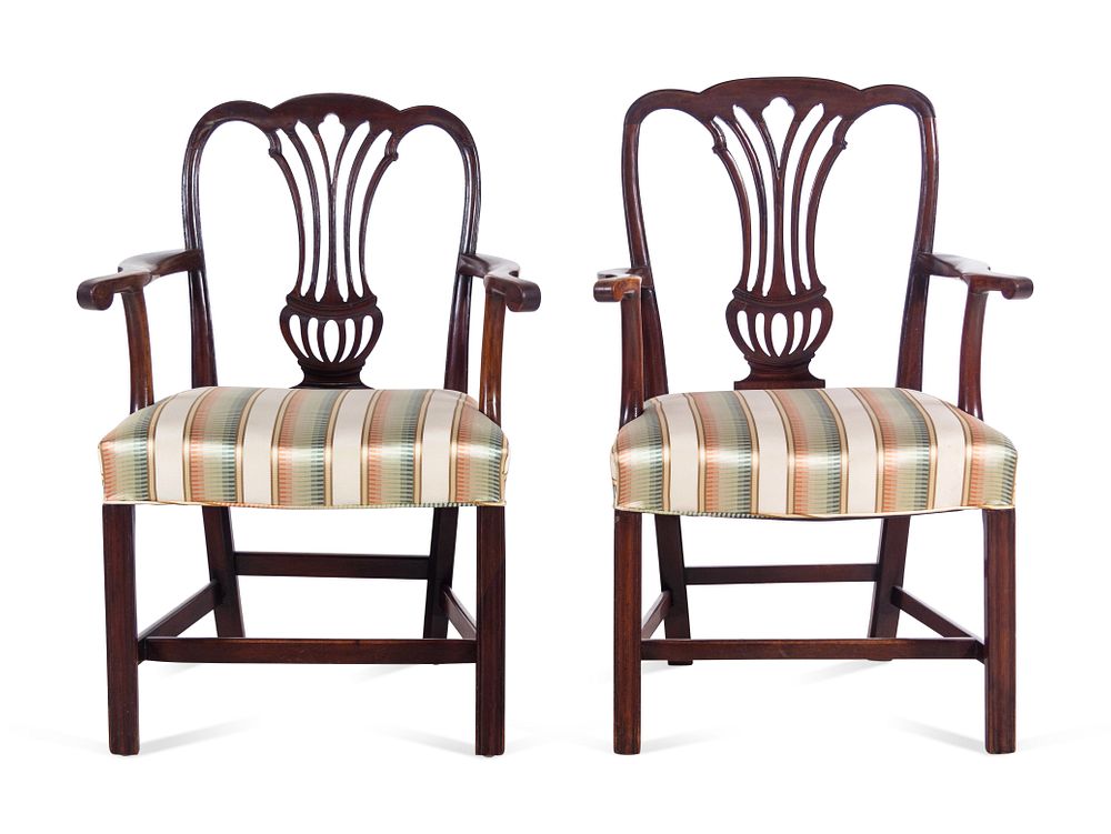 Appraisal: A Pair of George III Carved Mahogany Armchairs A Pair