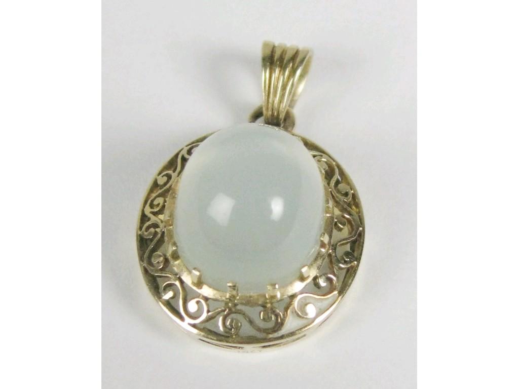 Appraisal: A Moonstone Pendant claw-set in pierced frame stamped ct