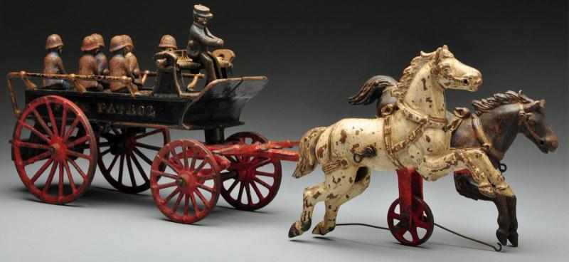 Appraisal: Cast Iron Ives Fire Patrol Wagon Horse-Drawn Toy Description American