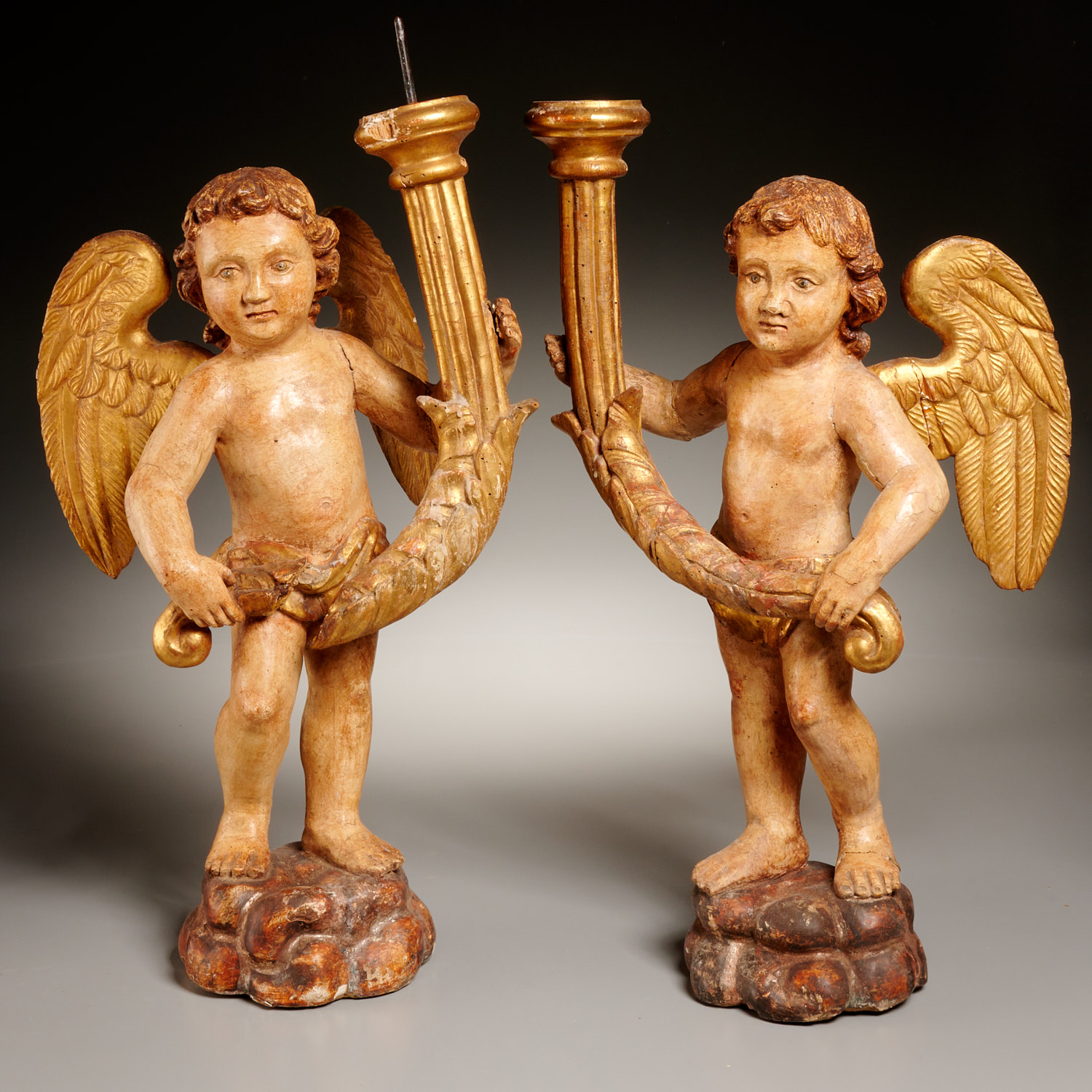 Appraisal: PAIR ITALIAN CARVED WOOD CHERUB CANDLEHOLDERS th th c Italy