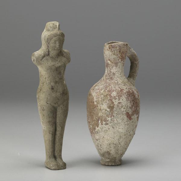 Appraisal: GRECO-ROMAN TRADE POTTERY Amphora and koure figure Larger