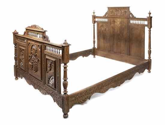 Appraisal: A Victorian Style Carved Bedroom Suite comprising a bed a