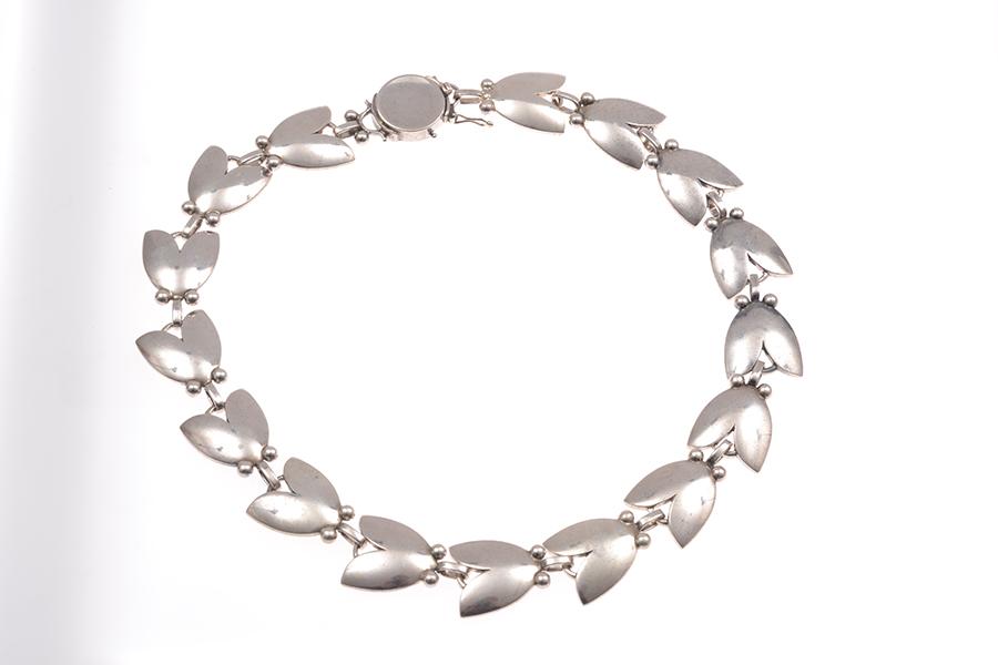 Appraisal: A NECKLACE BY GEORG JENSEN OF TULIP DESIGN IN STERLING