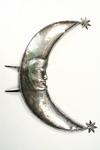 Appraisal: SILVER PLAQUE - Early silver repousse crescent moon with face