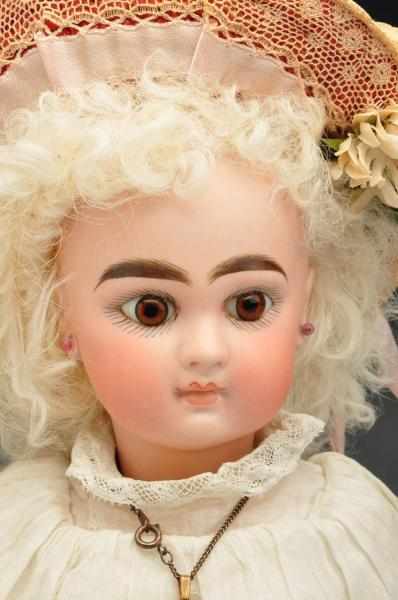 Appraisal: Bisque Closed Mouth Child Doll Description Bisque socket head for