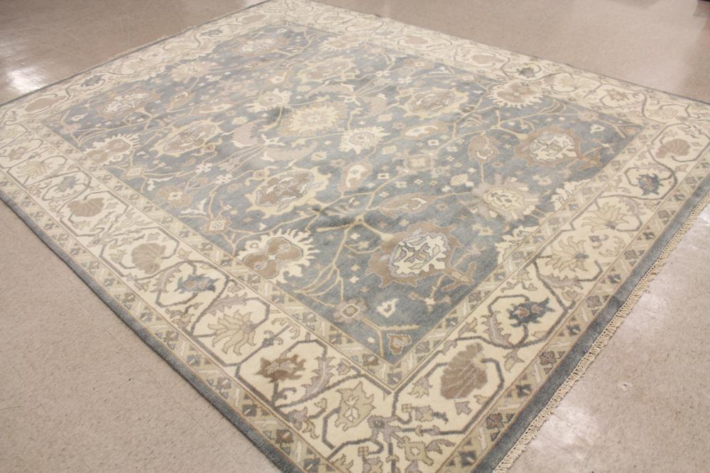 Appraisal: HAND KNOTTED ORIENTAL CARPET Indo-Persian oral floral arabesque design blue