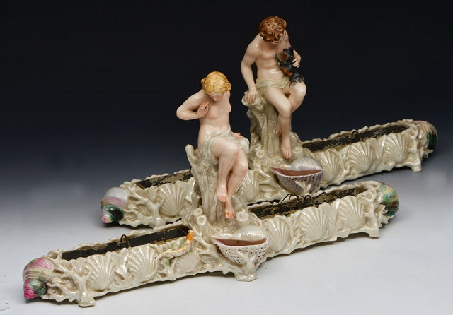 Appraisal: A PAIR OF ROYAL WORCESTER FIGURAL TABLE CENTRE PIECES one