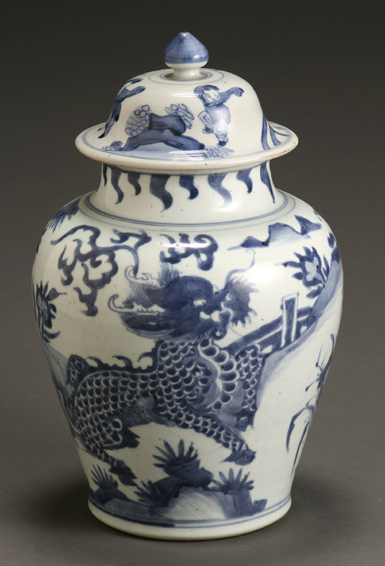 Appraisal: Chinese Blue and White Covered Urn th Century Scattered glaze