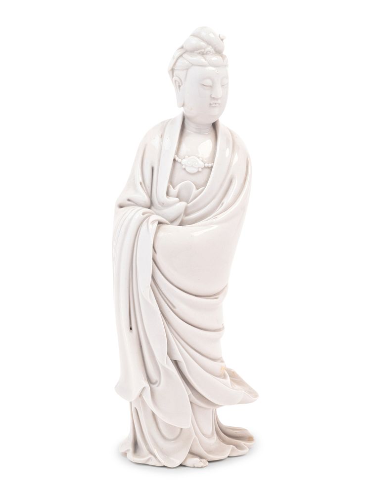 Appraisal: A Chinese Blanc-de-Chine Porcelain Figure of Guanyin A Chinese Blanc-de-Chine