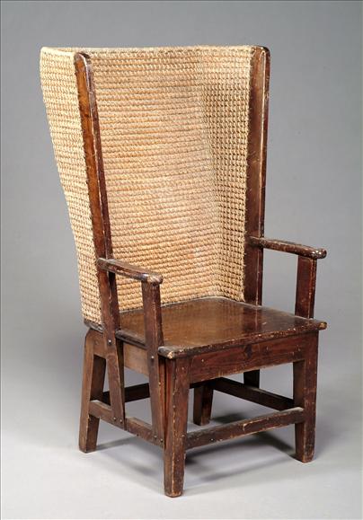 Appraisal: A stained pine and woven straw Orkney chair by Liberty