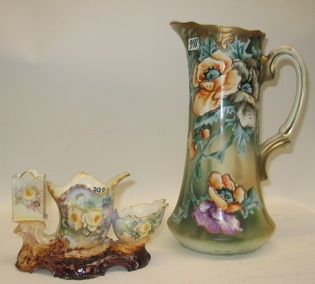 Appraisal: TWO HAND PAINTED PORCELAINS One is a decorative pitcher painted