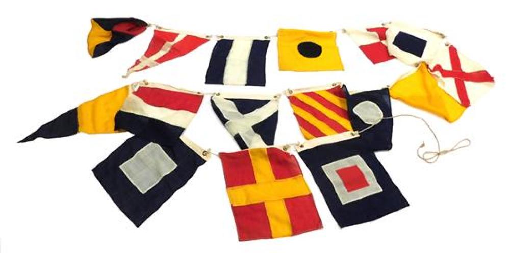 Appraisal: Cloth signal flags on rope sixteen flags red yellow blue