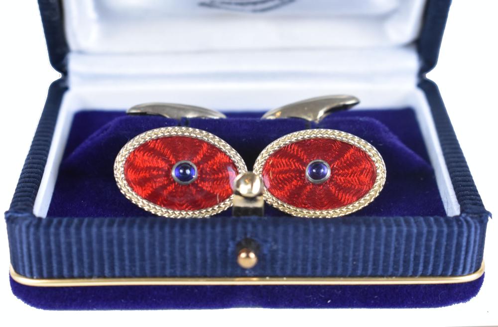 Appraisal: ANTIQUE RUSSIAN SILVER AND ENAMEL CUFFLINKSThe red enamel elliptical ovals