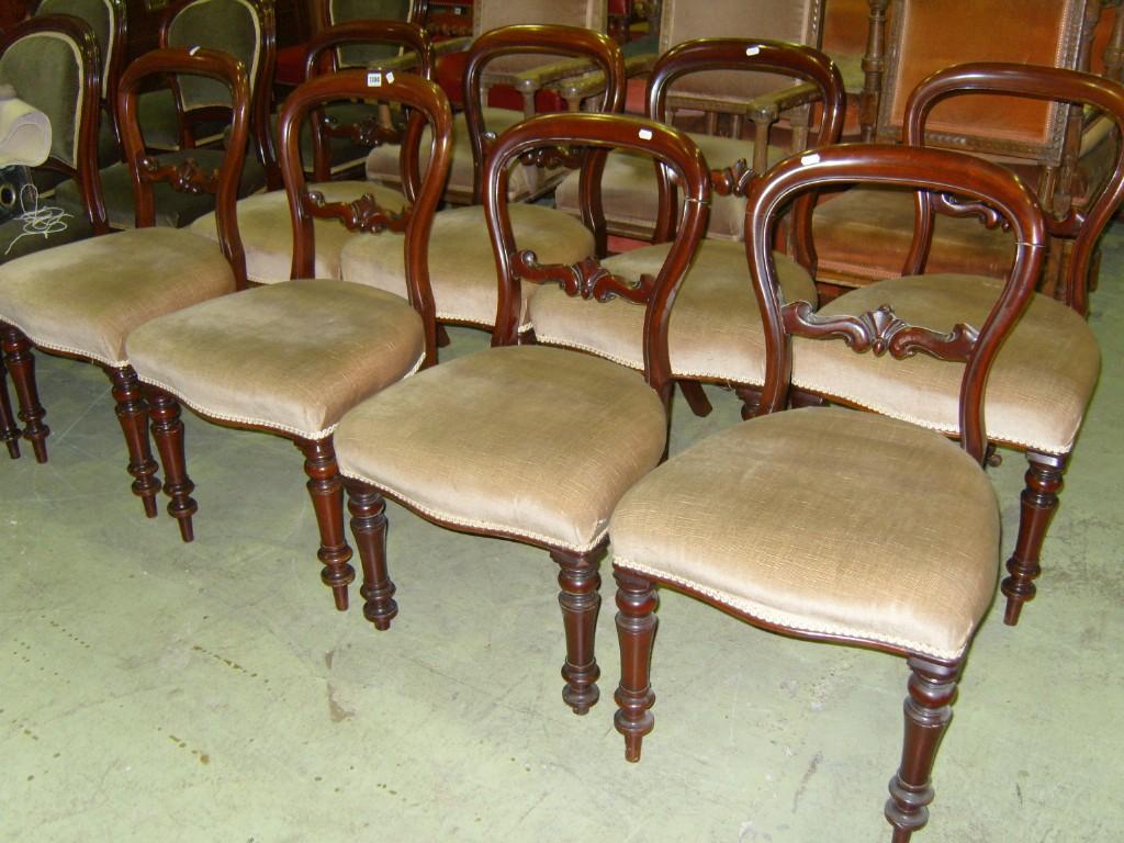 Appraisal: A set of eight Victorian mahogany balloon back dining chairs