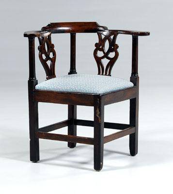 Appraisal: Chippendale mahogany corner chair pierced splats and column-form supports British