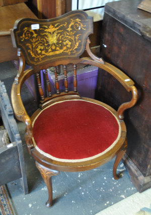 Appraisal: A pair of late Victorian inlaid mahogany library bow chairs