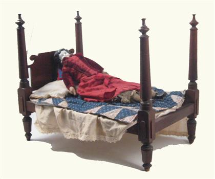 Appraisal: Queen Anne-style doll bed with doll th century The Queen