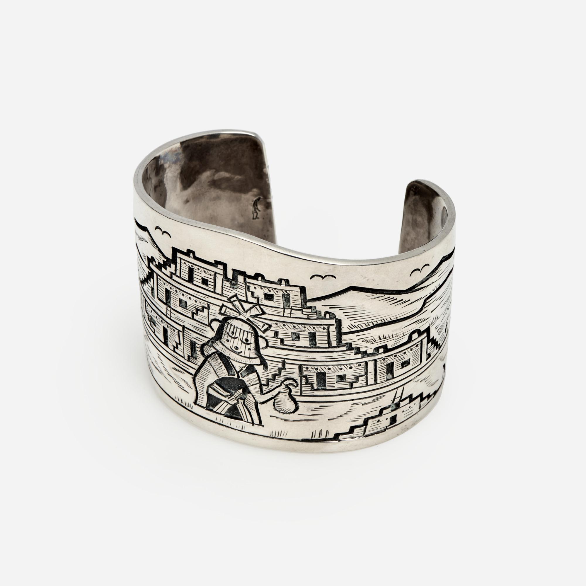 Appraisal: VICTOR COOCHWYTEWA SILVER OVERLAY CUFF FROM KOPAVI A sterling overlay