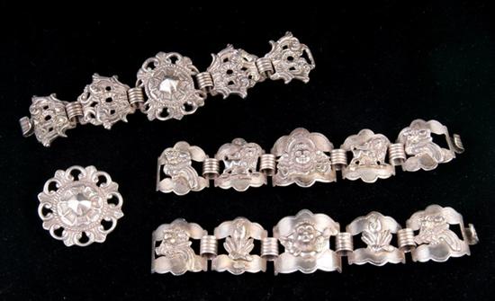 Appraisal: THREE PERUVIAN STERLING SILVER LINK BRACELETS AND BROOCH Circa s