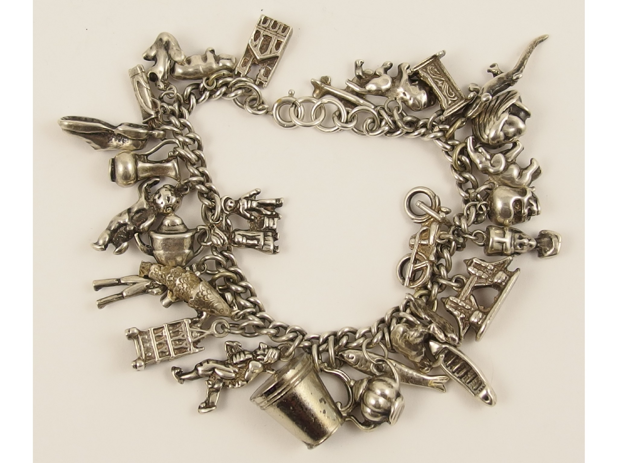 Appraisal: A silver charm bracelet