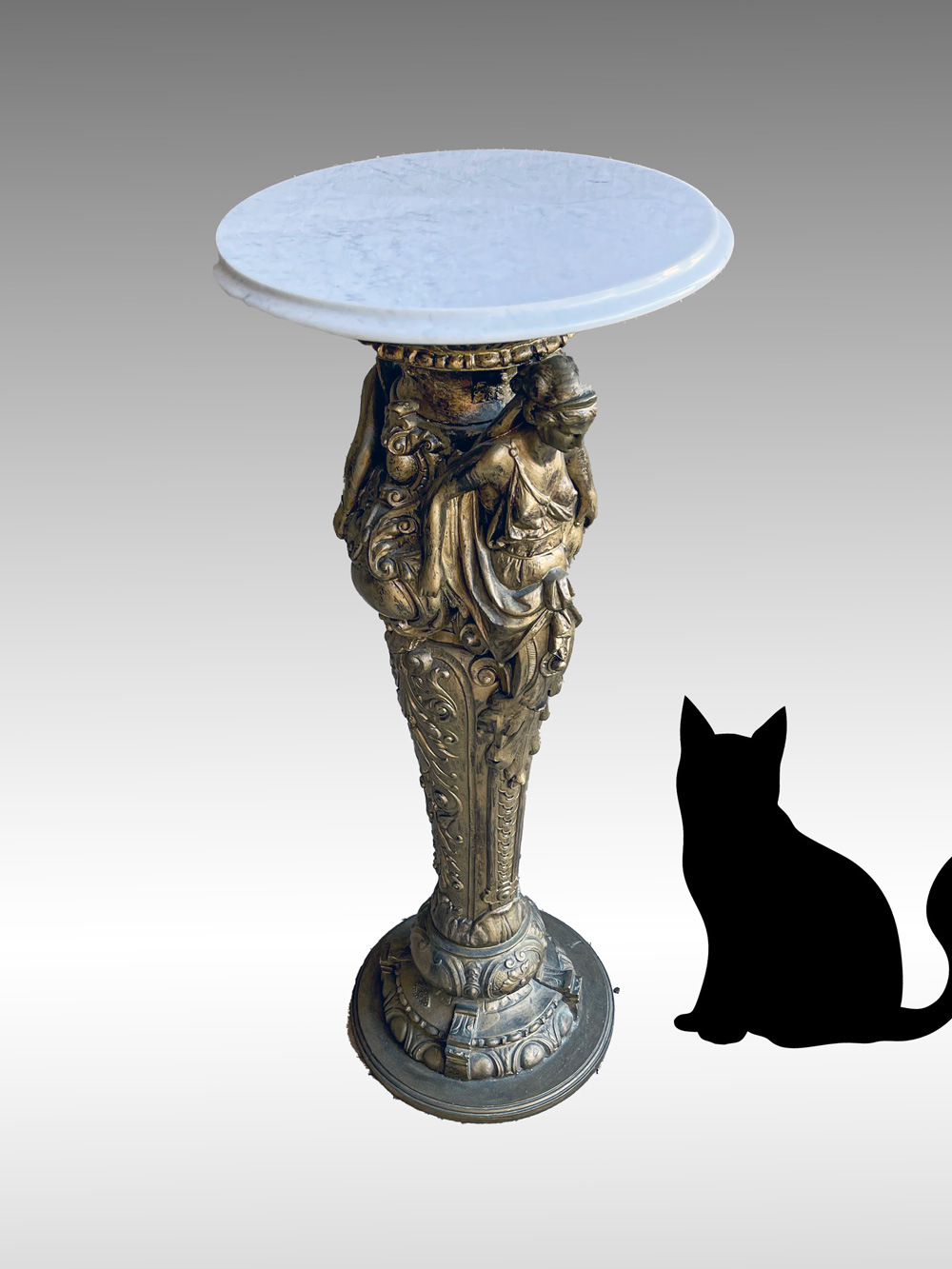 Appraisal: FIGURAL MARBLE TOP PEDESTAL STAND White marble on gilt plaster