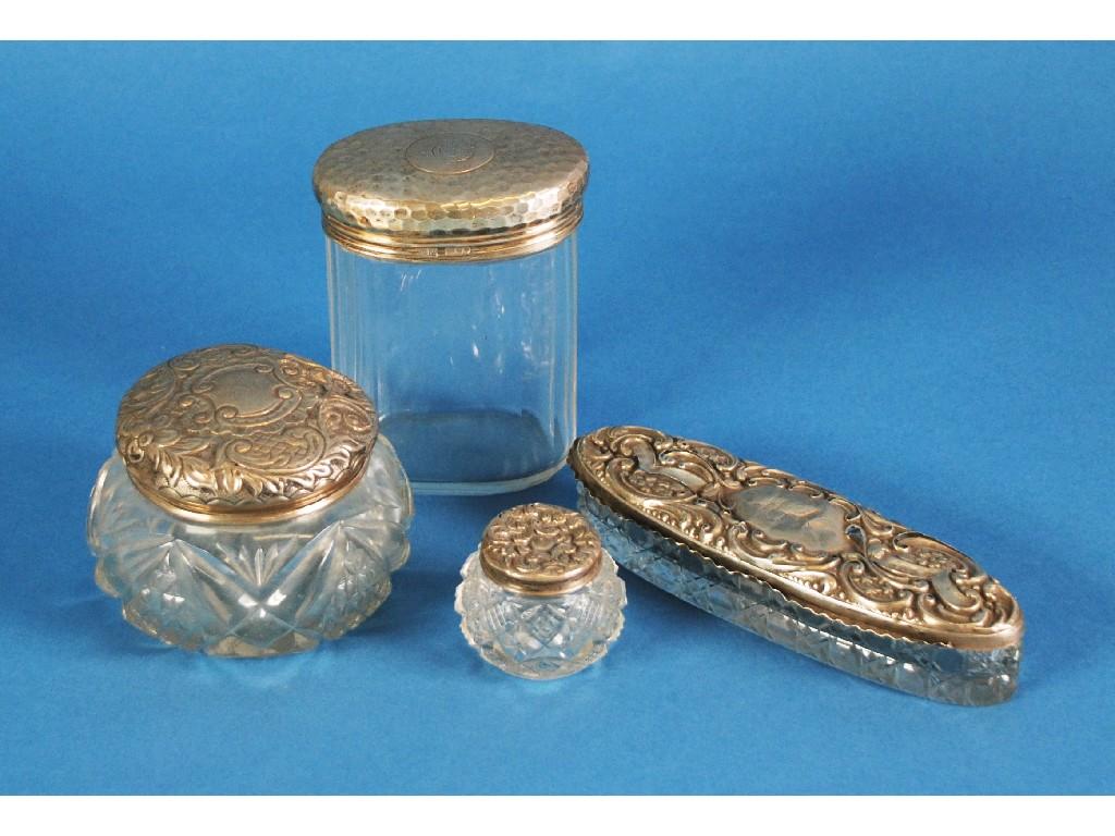 Appraisal: GEORGE V PANELLED OVAL TOILET JAR with planished silver cover