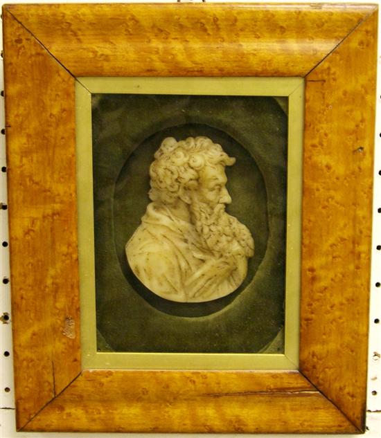 Appraisal: Ivory with brown accent wax portrait of bearded gentleman in