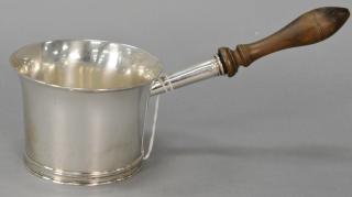 Appraisal: English silver sauce dish with wood handle and coat of