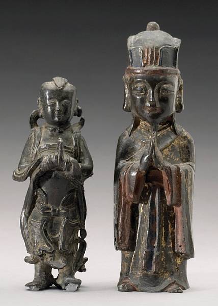 Appraisal: Two cast bronze figures Ming Dynasty The first a bearded