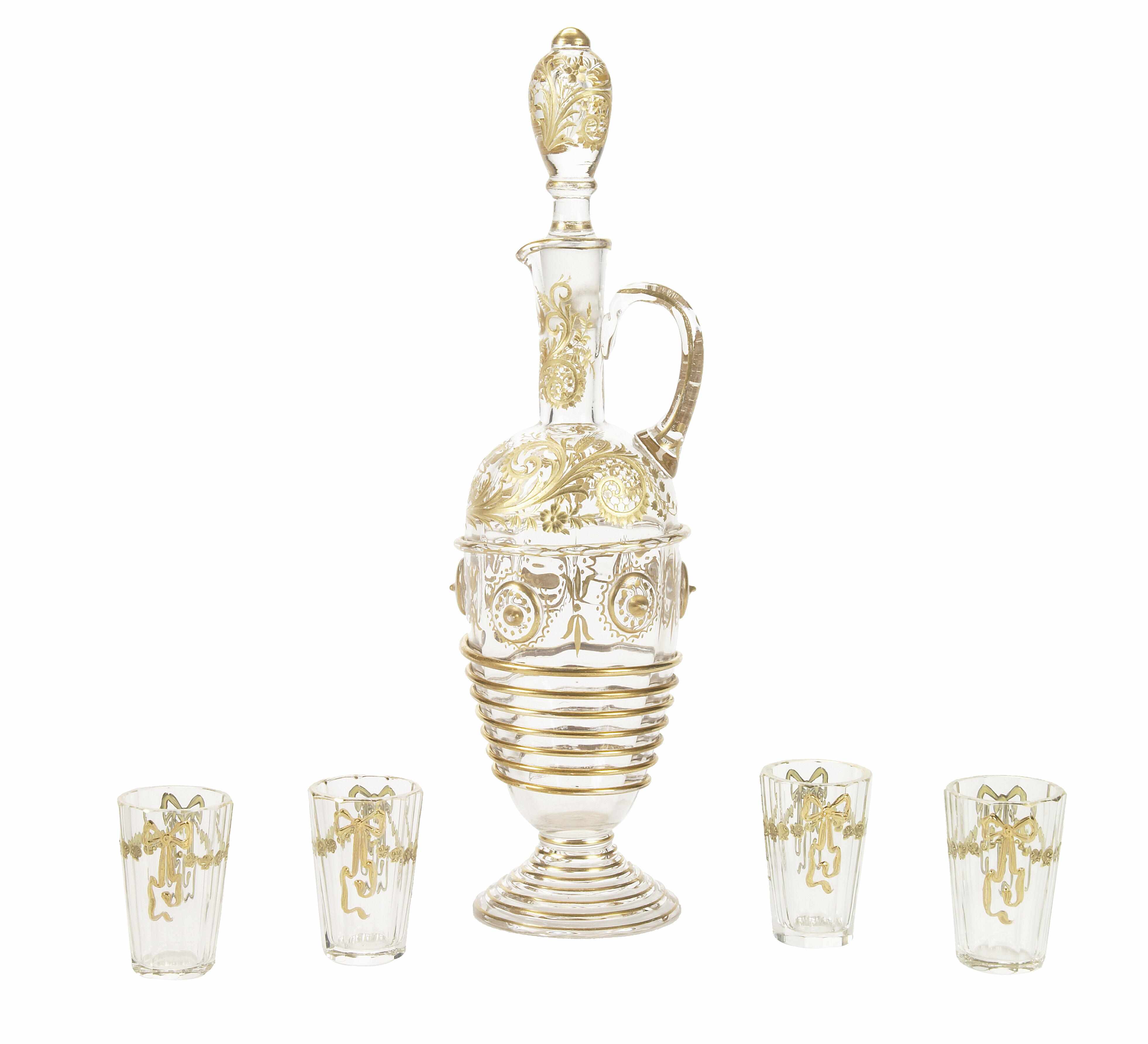 Appraisal: A Continental gilt heightened glass liqueur set comprising decanter with