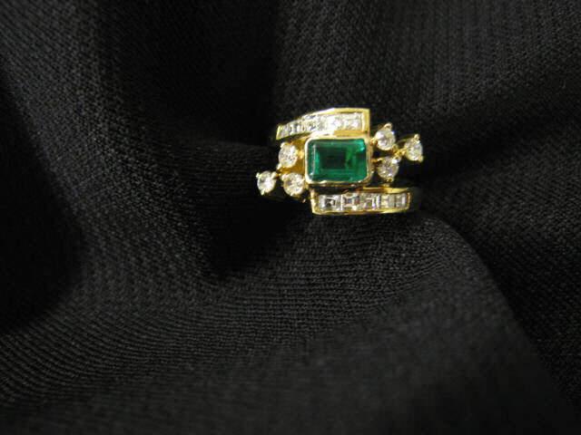 Appraisal: Emerald Diamond Ring fine rectangular gem weighing carat surrounded by