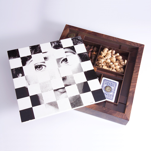 Appraisal: PIERO FORNASETTI Game set consisting of a transfer-printed playing board