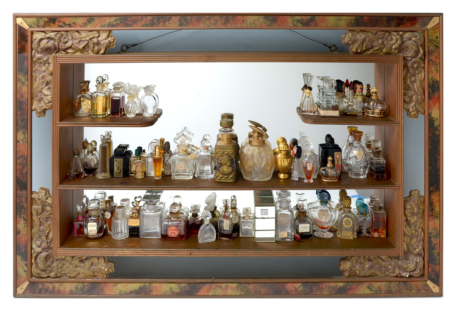 Appraisal: LARGE LOT OF VINTAGE PERFUME BOTTLES Sold with wall mount