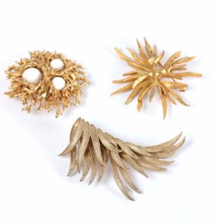 Appraisal: Gilt Metal Costume Designer Brooches Comprising a Hattie Carnegie a