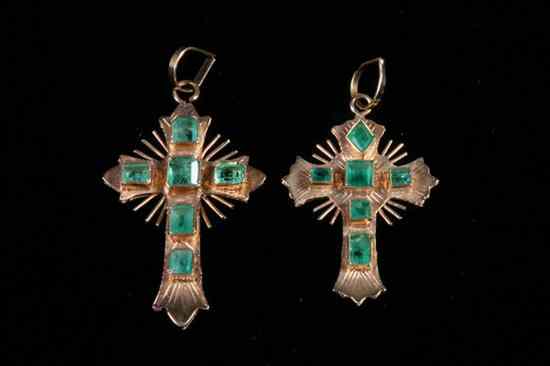 Appraisal: TWO K YELLOW GOLD AND EMERALD CHRISTIAN CROSS PENDANTS Each