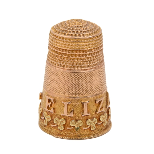 Appraisal: A Victorian three colour gold thimble applied with the name