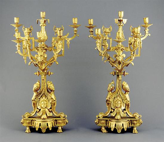 Appraisal: Pair Louis XVI style bronze eight-light candelabra scrolling arms extending