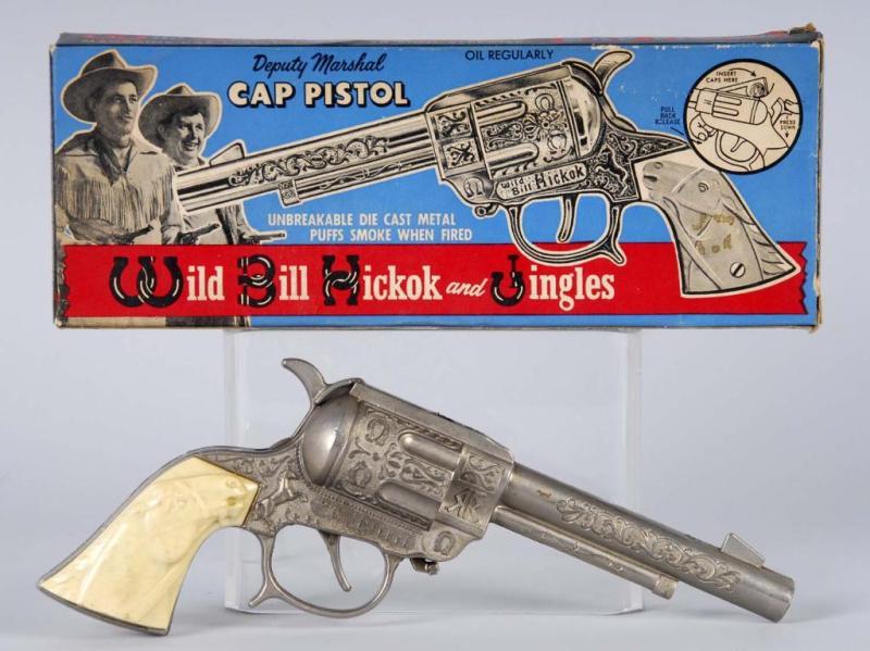 Appraisal: Wild Bill Hickcok and Jingles Cap Gun Description Pop top