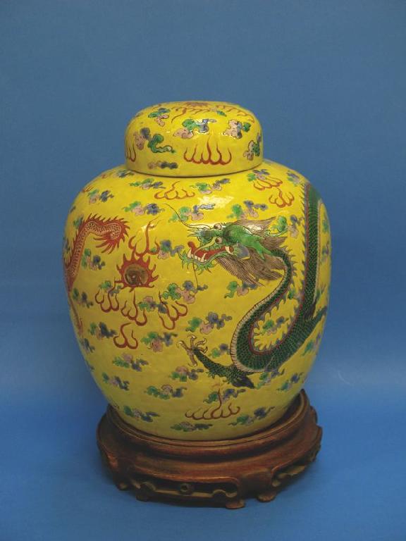 Appraisal: A CHINESE FAMILLE JAUNE JAR AND COVER enamelled in polychrome