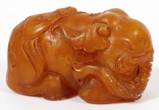 Appraisal: CHINESE CARVED HARD STONE RECUMBENT ELEPHANT CHINESE CARVED HARD STONE