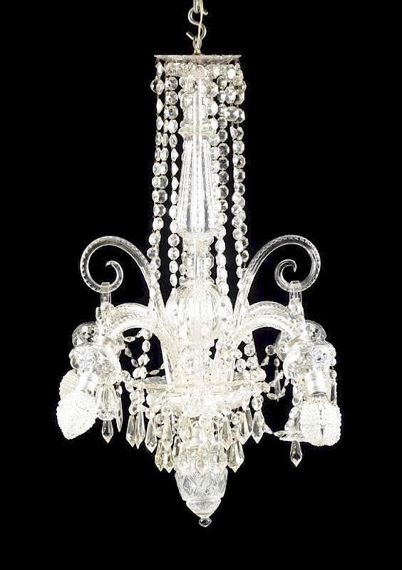 Appraisal: A GEORGIAN STYLE CUT CRYSTAL FOUR LIGHT CHANDELIER POSSIBLY LATE