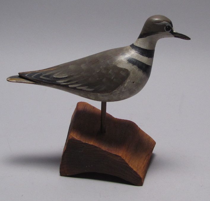 Appraisal: DECORATIVE CARVED KILLDEER DECOY By Davy Rhodes Mounted on a