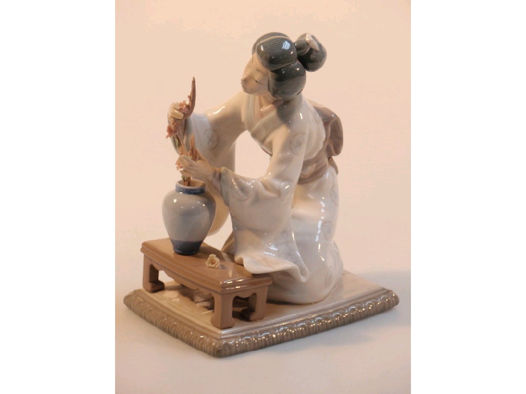 Appraisal: A Lladro figure of a kneeling geisha cm high